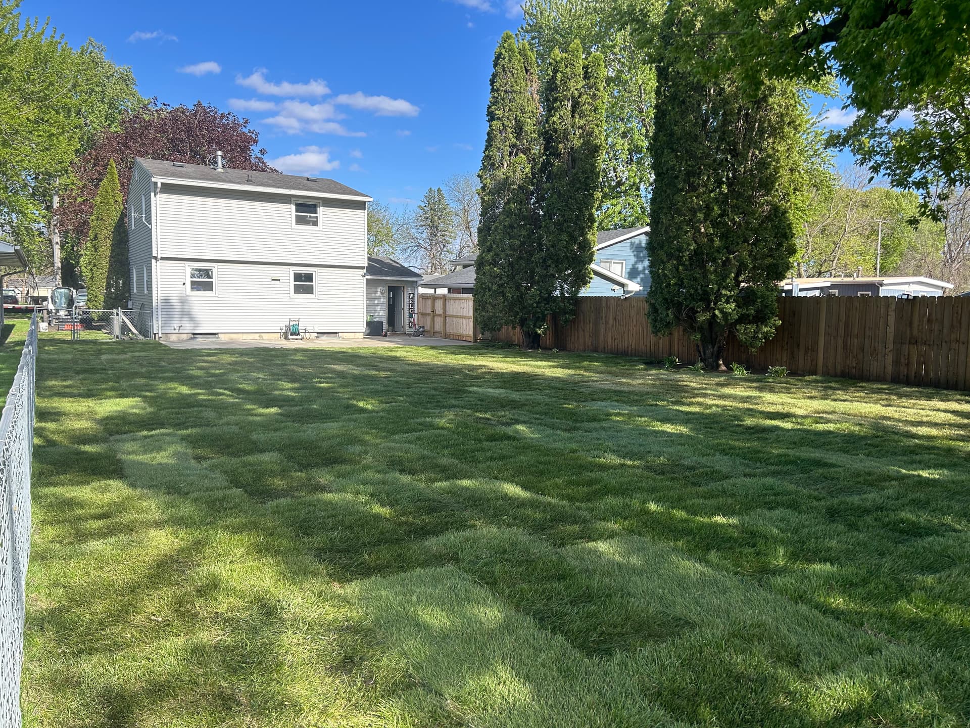 Gallery photos for Concrete Patio and Fresh Sod Turn a Backyard Into Something Usable: Image #1
