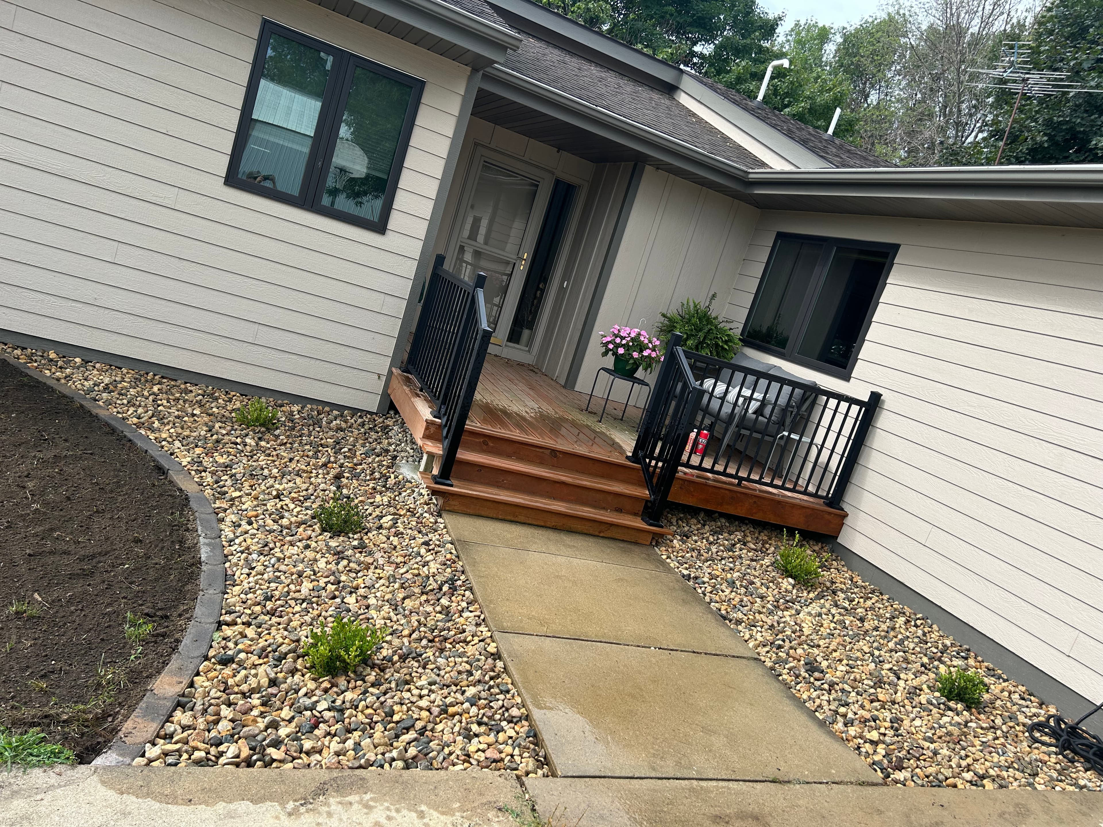 Project Fresh Landscaping with New Boxwoods, Rock, and Grading image