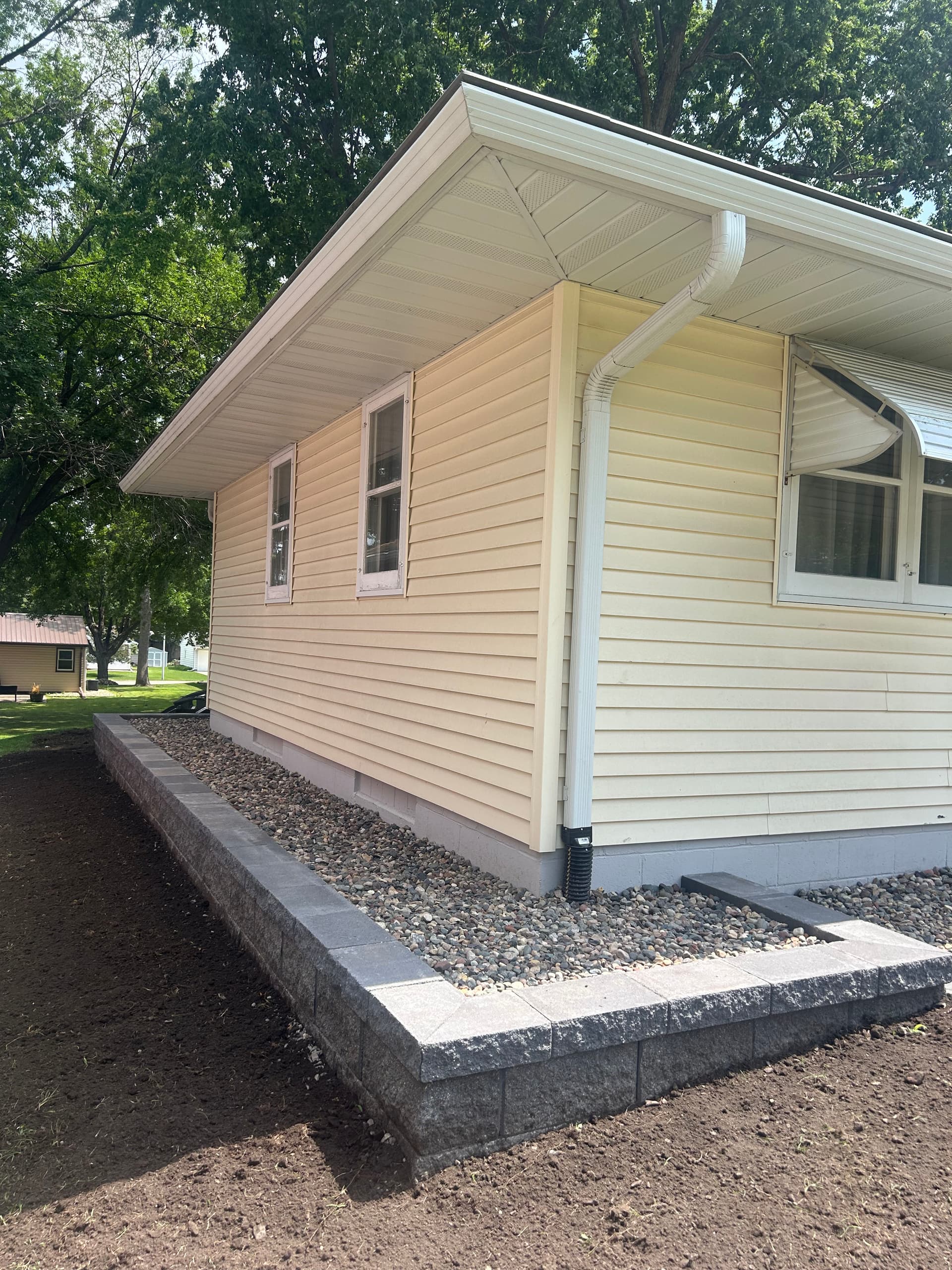 Gallery photos for Retaining Walls, Rock Beds, Stamped Patio and More - Full Yard Overhaul: Image #2
