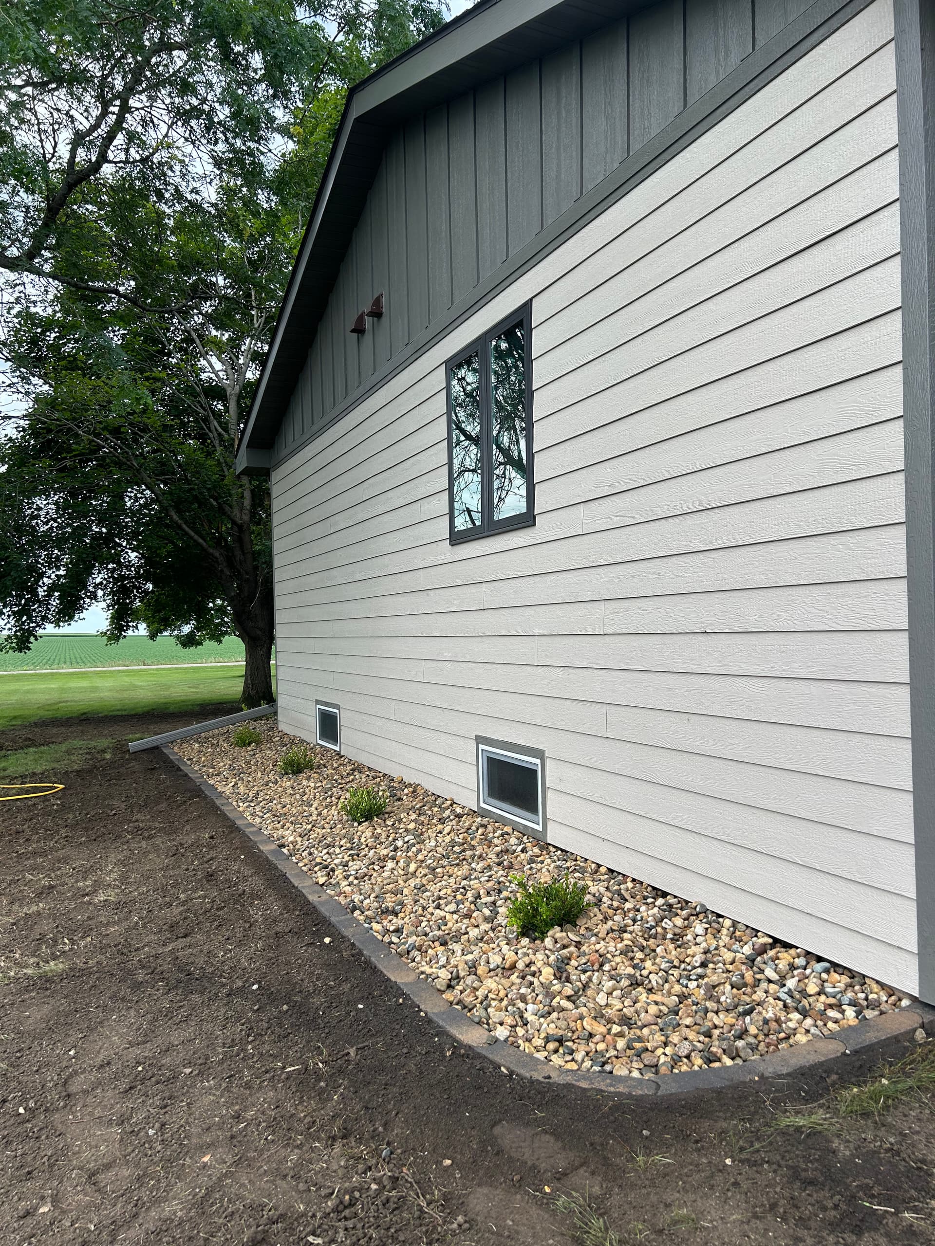 Gallery photos for Fresh Landscaping with New Boxwoods, Rock, and Grading: Image #4