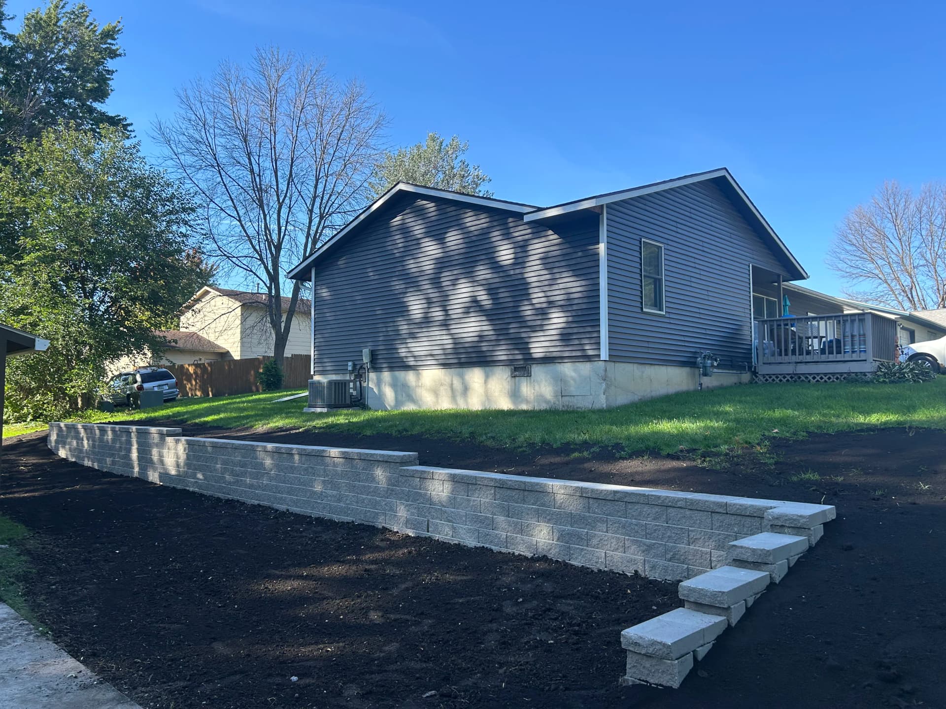 Retaining Wall Built to Hold Slope and Reclaim Yard Space image